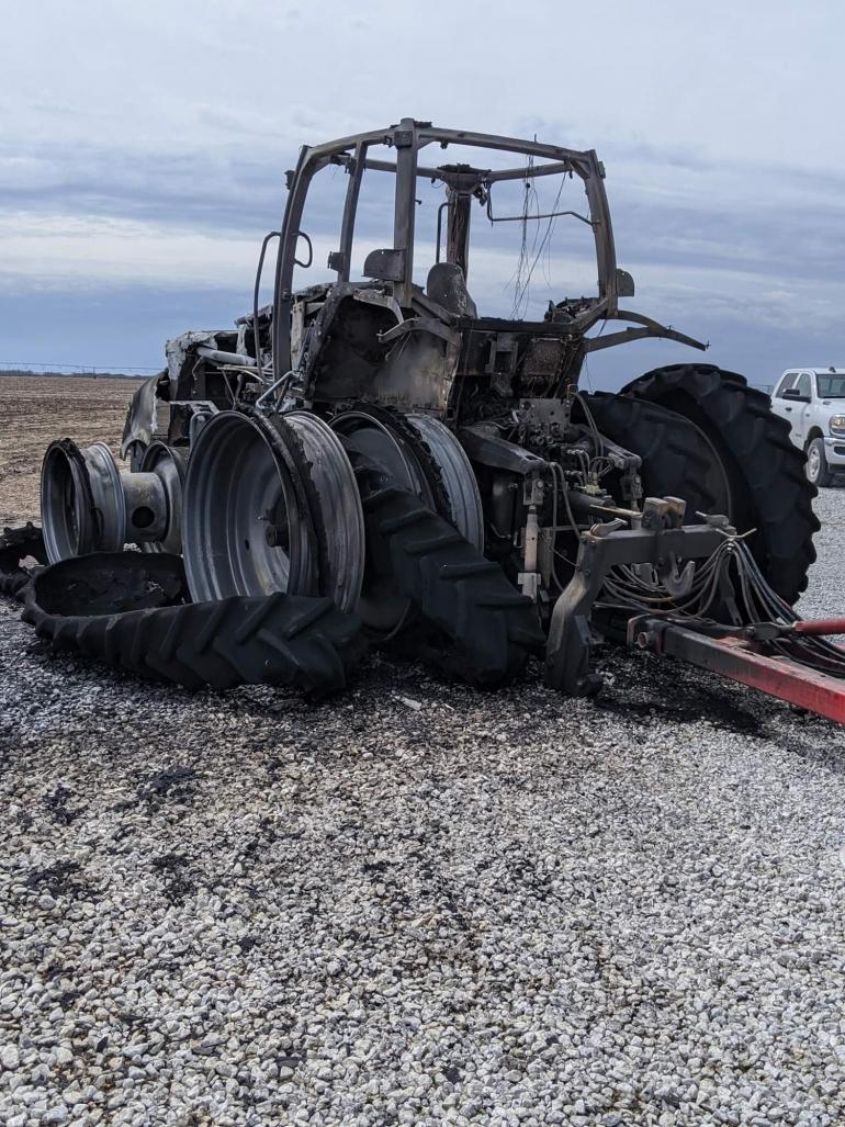 The blackened outline of the Nedrows' tractor remains following a tractor fire in April of 2020.