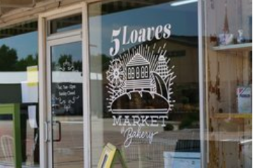 5 loaves store window