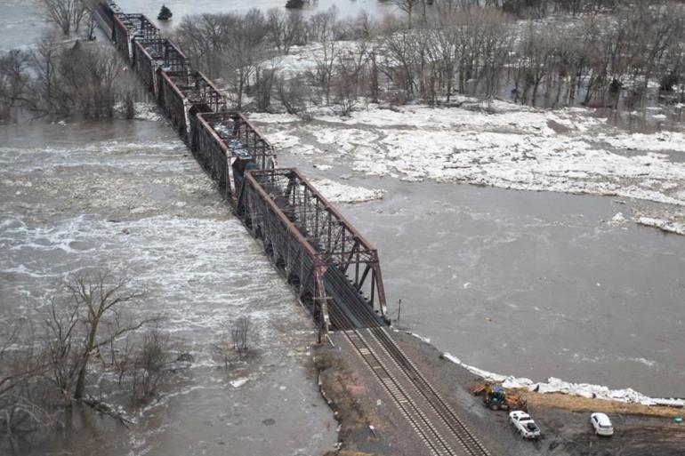 A bridge is partially submerged in this photo from Nebraska's historic flooding in March of 2019